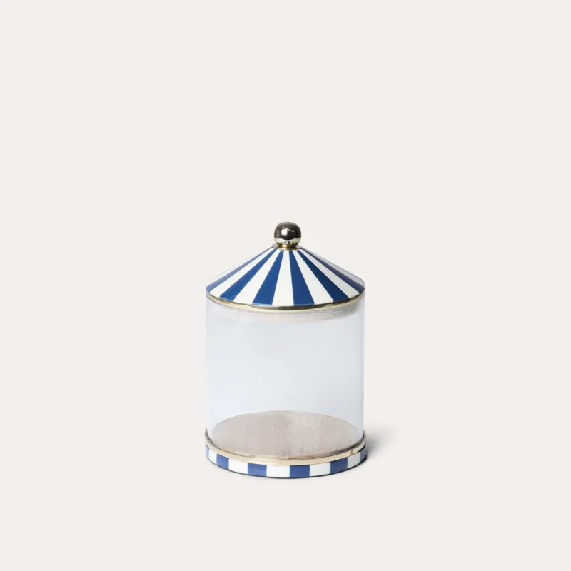 A clear acrylic storage jar with blue and white striped lid and base