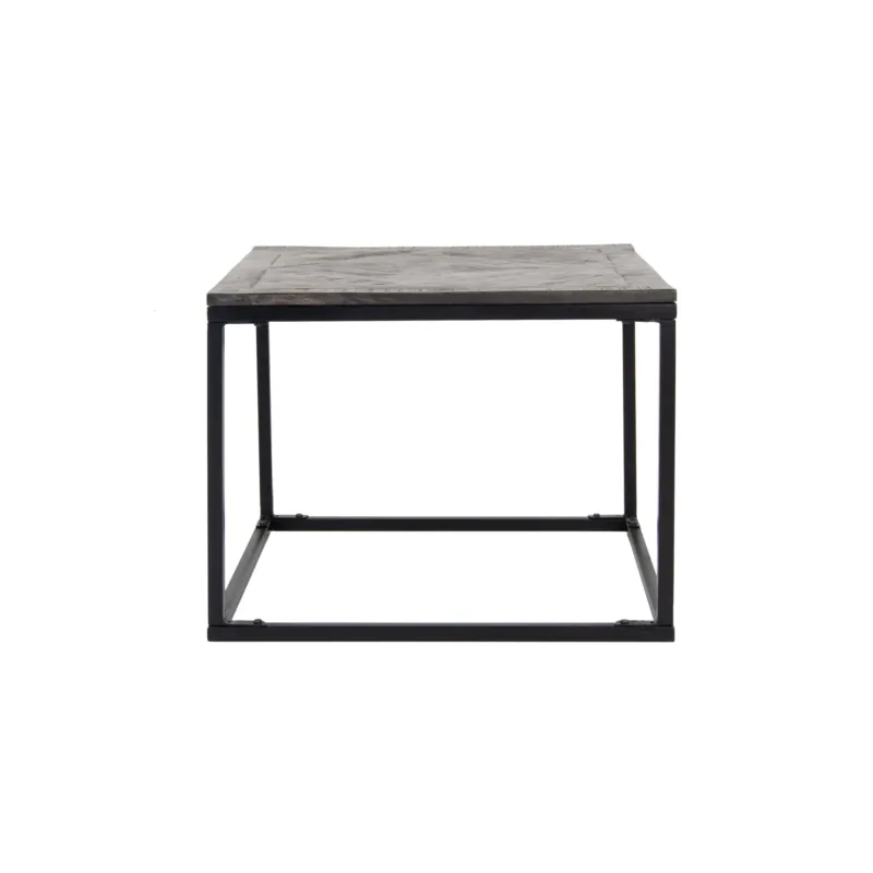 Tisch mit grauer Holzplatte und schwarzem Metallgestell.