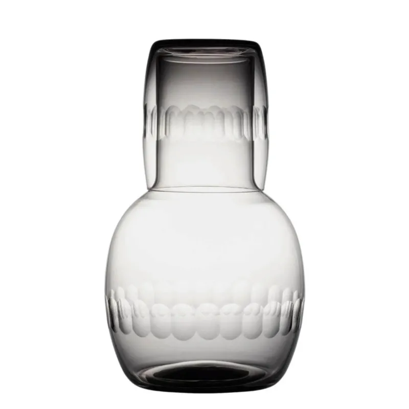 A smoky crystal carafe set with lens design
